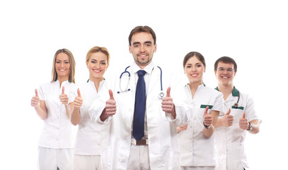 A team of young Caucasian doctors in white clothes