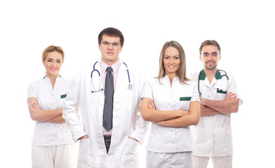 A team of young Caucasian doctors in white clothes