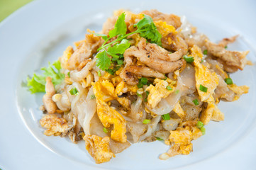 Stir fried noodles with egg, pork, and soy bean sauce