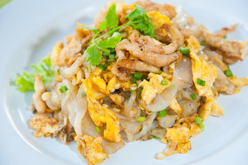 Stir fried noodles with egg, pork, and soy bean sauce