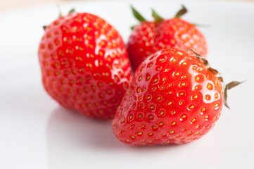 Three Strawberries