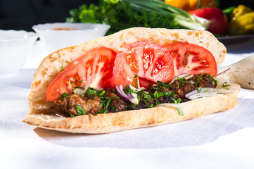 Lavash with grilled meat and vegetables