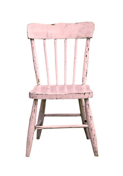 vintage pink child's chair on a white background