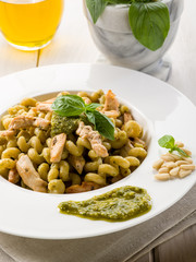 pasta with pesto sauce and chicken breast, healthy food