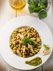 pasta with pesto sauce and chicken breast, healthy food