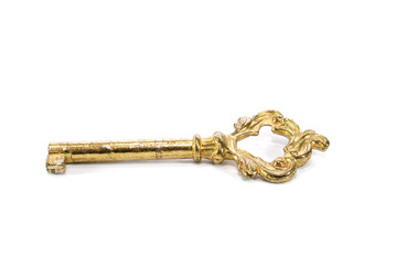 Antique gold key isolated on white background.