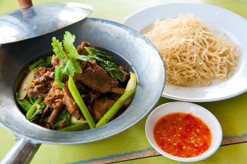 Baked goose with red pepper , chinese noodle and sauce