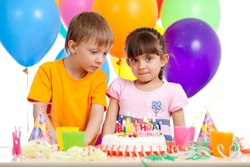 adorable children celebrating birthday party