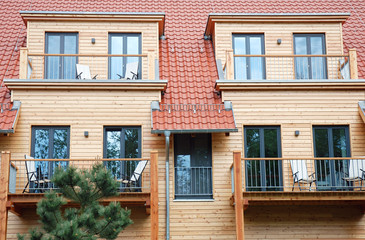 Detail of a house with wooden facade - Mehrfamilien Holzhaus