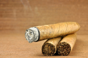 brown cigar burned