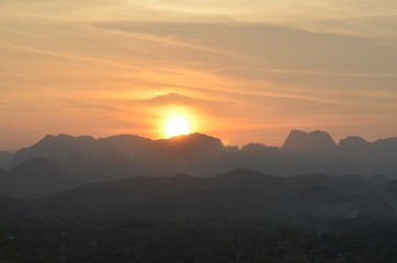 back tree and mountain landscape at Sunset