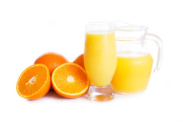 Orange juice in jug and glass