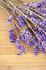 Obraz na płótnie Canvas Dried lavender on a wooden desk