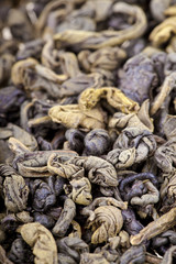 Dried green tea leaves texture