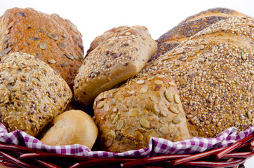 multigrain bread and roll in a basket