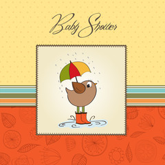 baby shower card with little bird stand in the rain