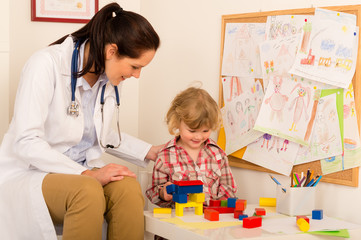 Visit at pediatrician child girl playing