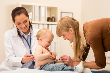 Pediatrician check-up baby girl with stethoscope