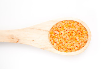 Wooden spoon with lentils