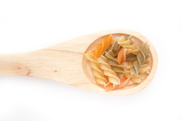 Wooden spoon with pasta