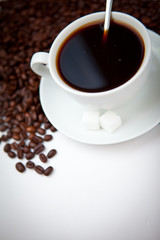 Obraz na płótnie Canvas Black coffee with beans