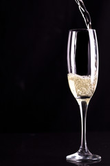 Glass of champaigne being filled