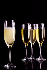 Four full flutes of champagne