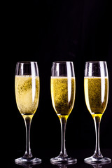 Three full glasses of champagne