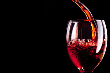 Stemware being filled with wine