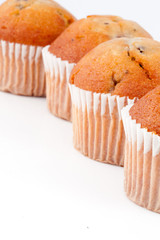 Close up of four muffins