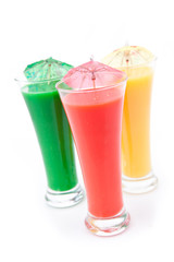 Cocktail umbrellas in full glasses