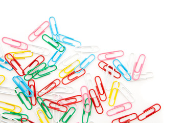 Many paper clips laid out together