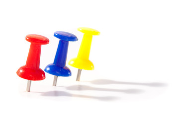 Three push pins