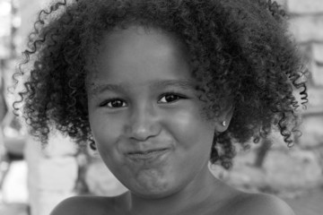 Young black girl with curly hair
