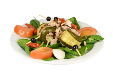 Zucchini rolls with Tuna on a white background.