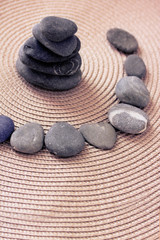 stacked zen stones and stones in circle