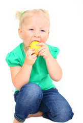 child with an appetite for eating an apple