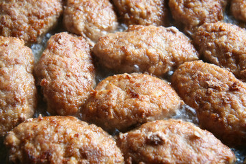 meat cutlets fried on frying pan