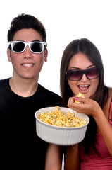 Young Couple Eating Popcorn
