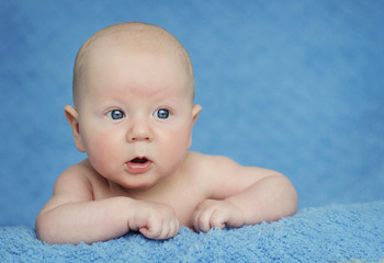 Adorable portrait of three months old baby