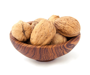 Walnut in the wooden plate