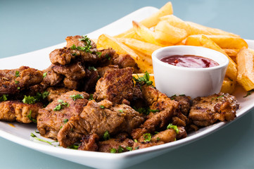Grilled meat with French fries