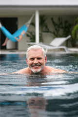 Senior man in a swimming pool