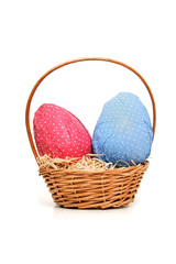 Easter eggs and wicker basket