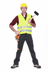 full-body portrait of carpenter holding hammer