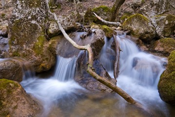 small cascades on a mountain river