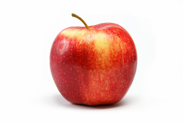 Ripe juicy natural red apple on a white background.