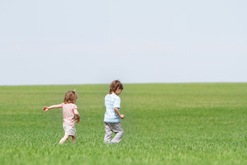 children playing on natural background