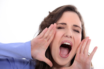 Woman yelling on white background