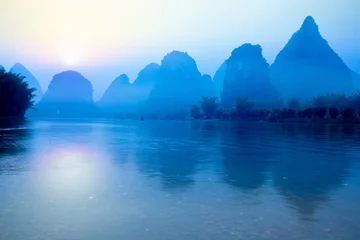 Abwaschbare Fototapete Guilin Guilin bei Sonnenaufgang